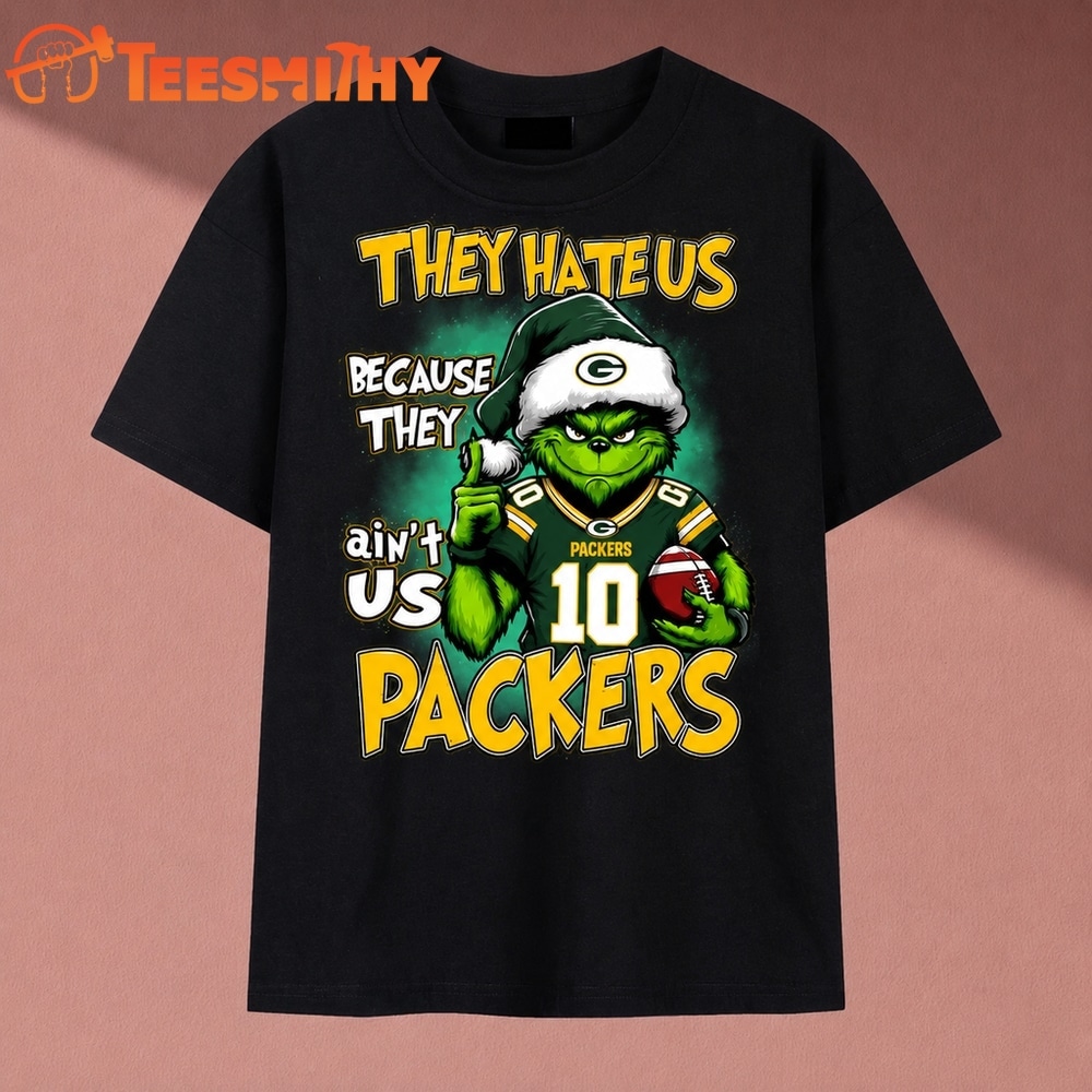 They Hate Us Because They Ain't Us Packers Grinch Christmas 2026 T Shirt